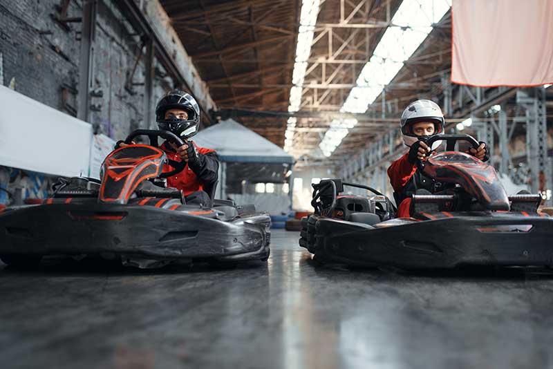 go kart drivers line up to race
